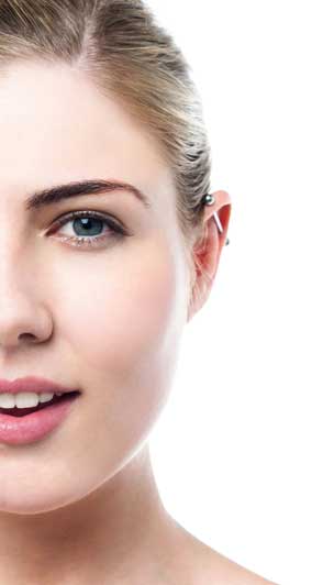 ear piercing woman white